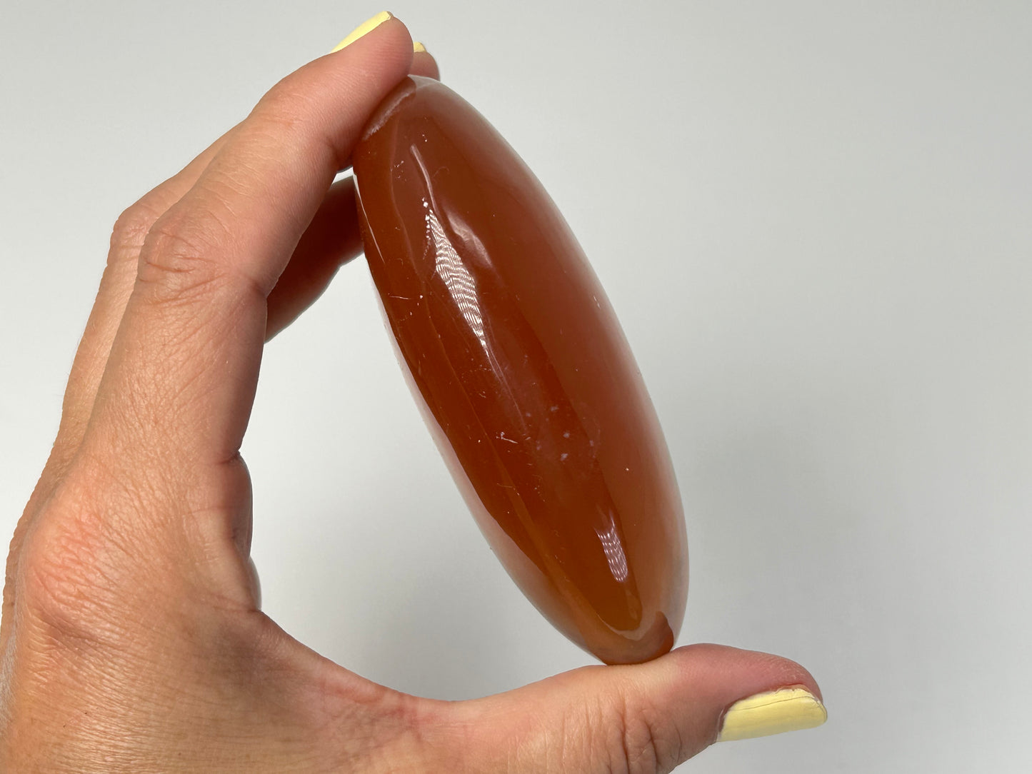 Honey Calcite Palm Stone (3.5", 88mm)