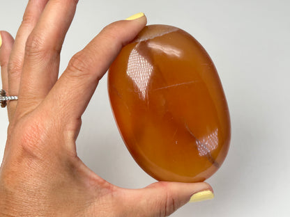 Honey Calcite Palm Stone (3.5", 88mm)