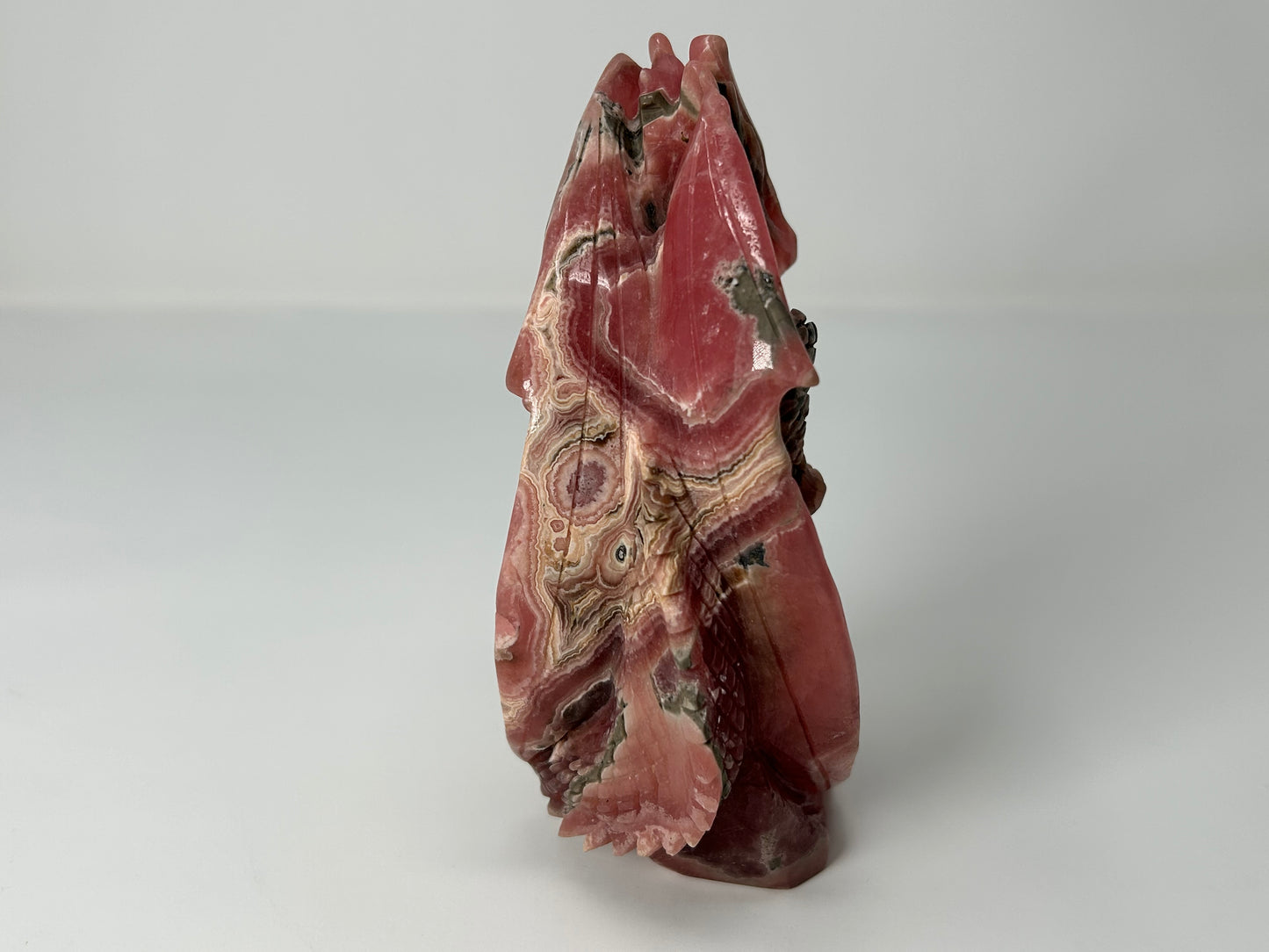 Rhodochrosite Skull with Dragon (5.5", 141mm)