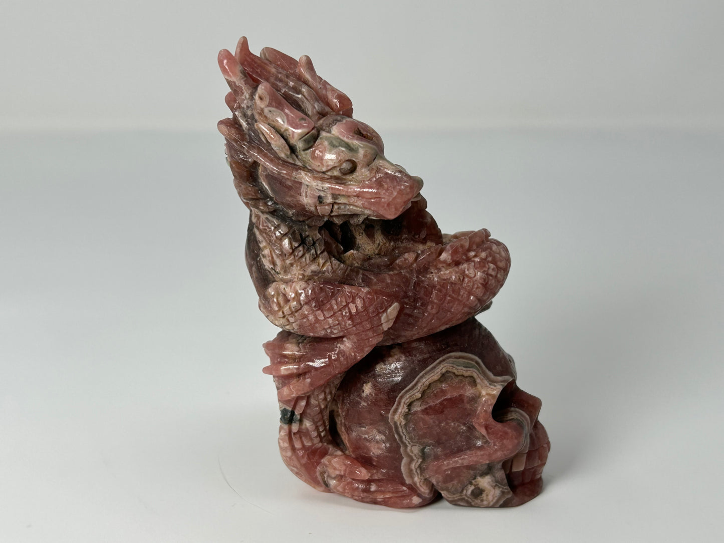 Rhodochrosite Skull with Dragon (4.5", 115mm)