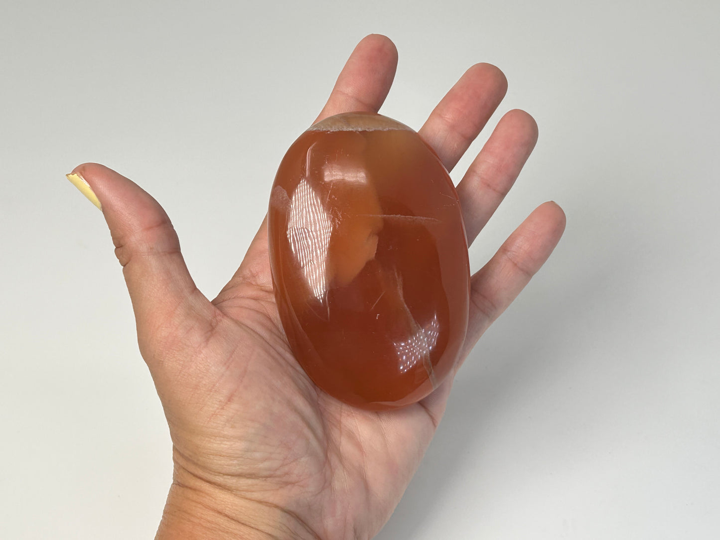 Honey Calcite Palm Stone (3.5", 88mm)