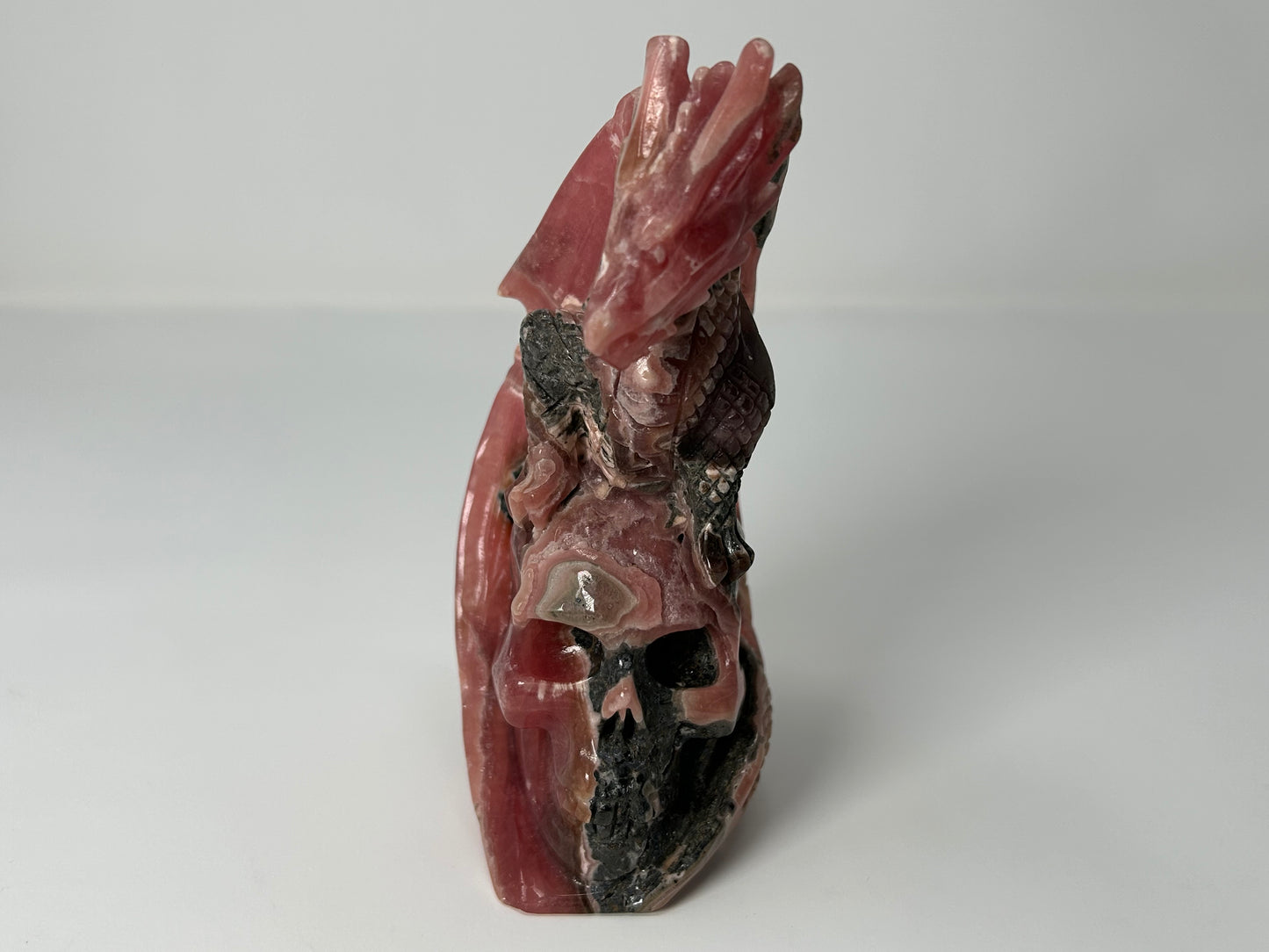Rhodochrosite Skull with Dragon (5.5", 141mm)