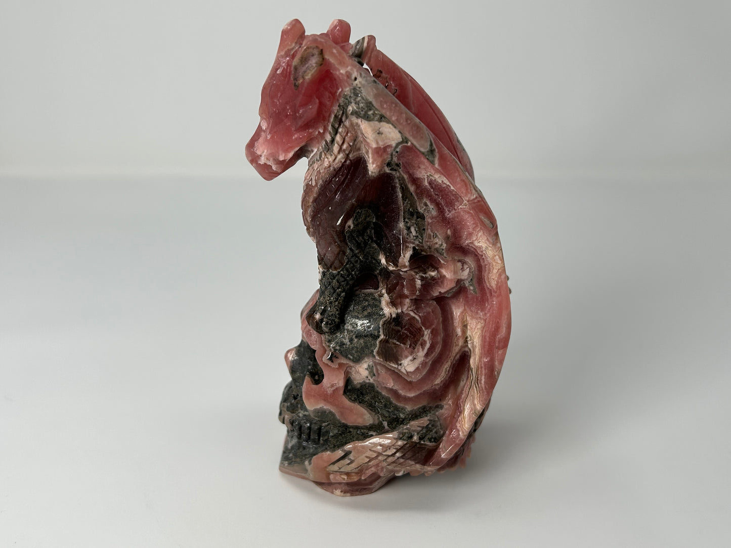 Rhodochrosite Skull with Dragon (5.5", 141mm)