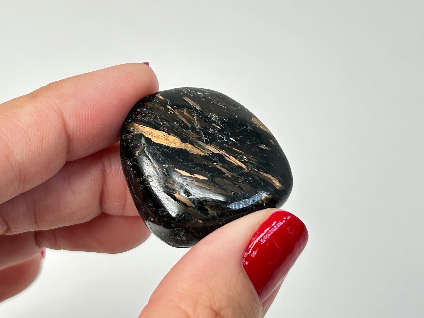 Nuummite Tumble #25