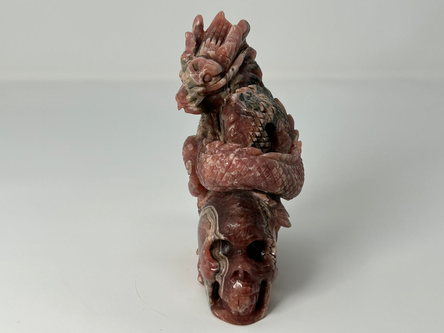 Rhodochrosite Skull with Dragon (4.5", 115mm)