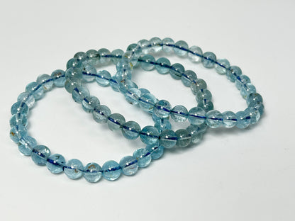 Blue Topaz Bracelets for meditation mindfulness and grounding on a white background