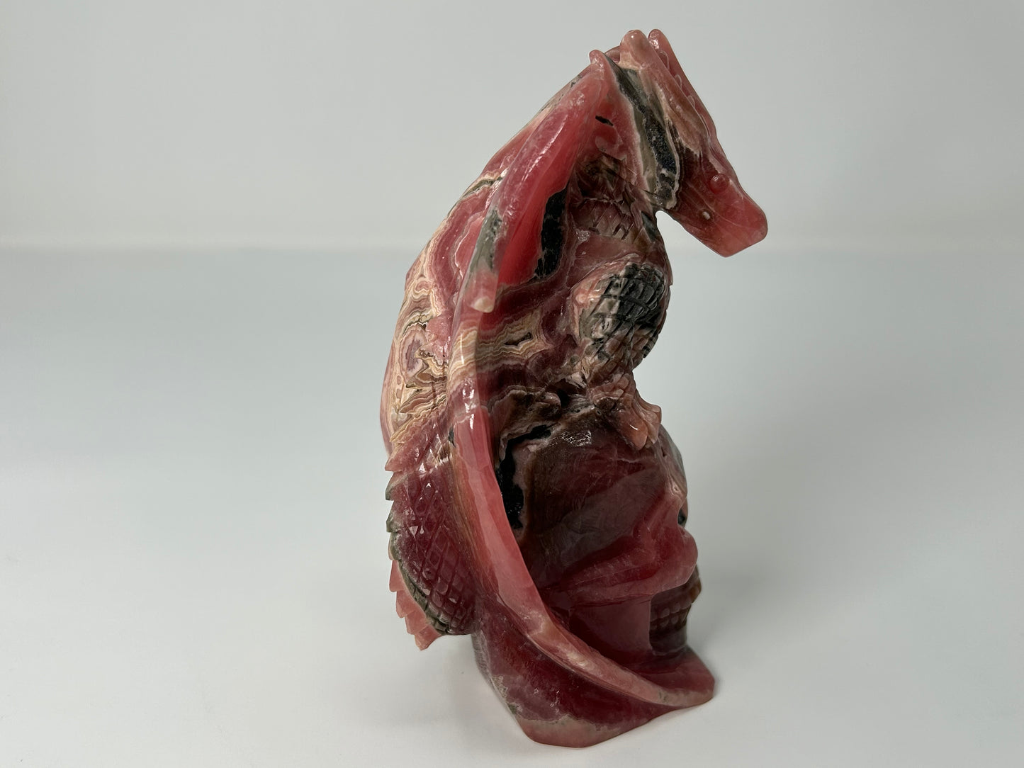 Rhodochrosite Skull with Dragon (5.5", 141mm)