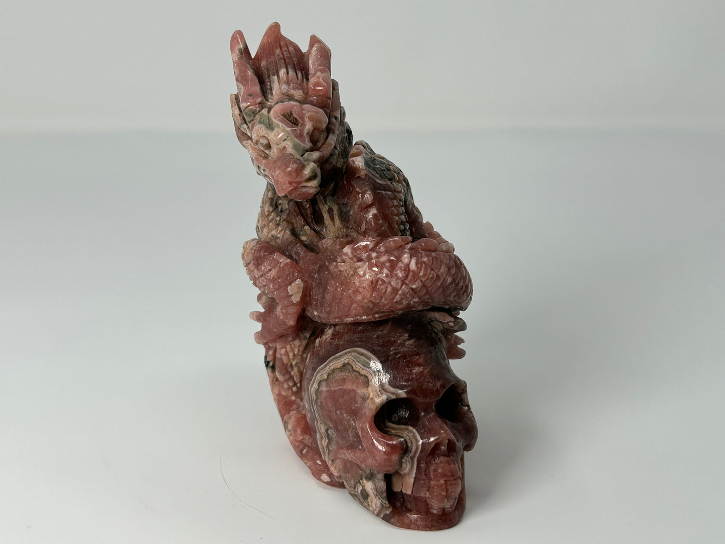 Rhodochrosite Skull with Dragon (4.5", 115mm)
