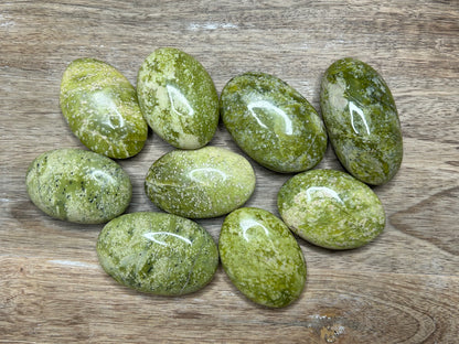 Green Serpentine palm crystal grounding spiritual awakening stone