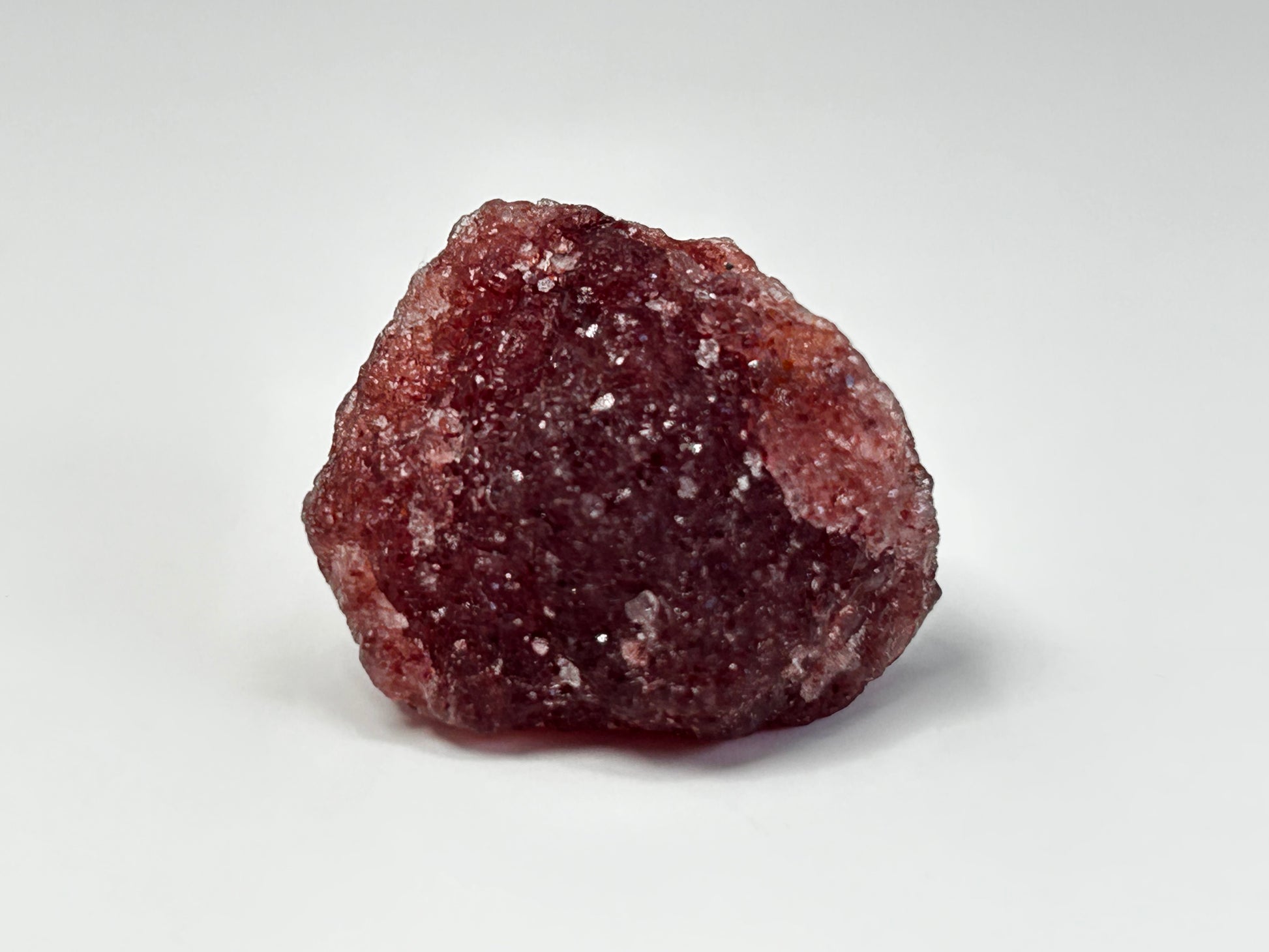 Natural Cherry Tanzurine Chunk for meditation and energy work with white background.