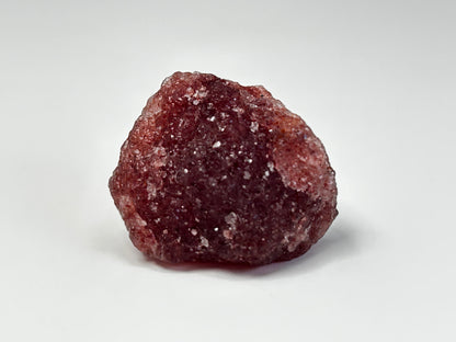 Natural Cherry Tanzurine Chunk for meditation and energy work with white background.