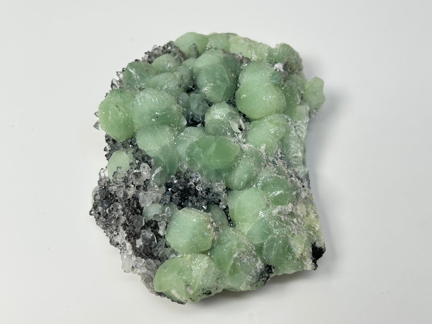 Prehnite on Quartz Cluster reiki charged crystal with green crystal colors.