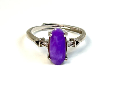 Purple Sugilite Crystal in Sterling Silver Ring with Cubic Zirconia for meditation and energy work with white background